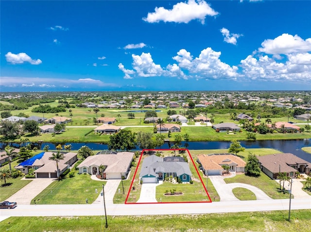 926 Boundary Blvd, Rotonda West, FL 33947 - aerial view of residential area with property boundaries highlighted and a large body of water