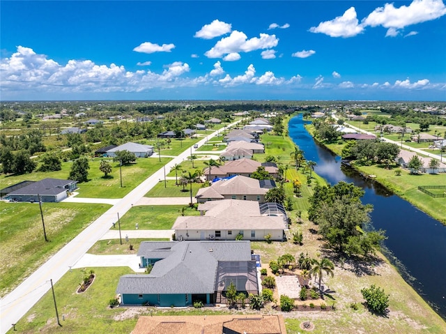 926 Boundary Blvd, Rotonda West, FL 33947 - aerial perspective of suburban area with a large body of water