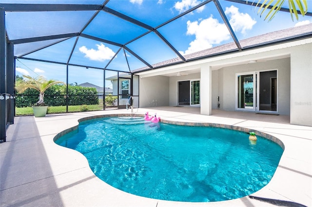 6 Medalist Ct, Rotonda West, FL 33947 - swimming pool with a patio area, a ceiling fan, and a lanai