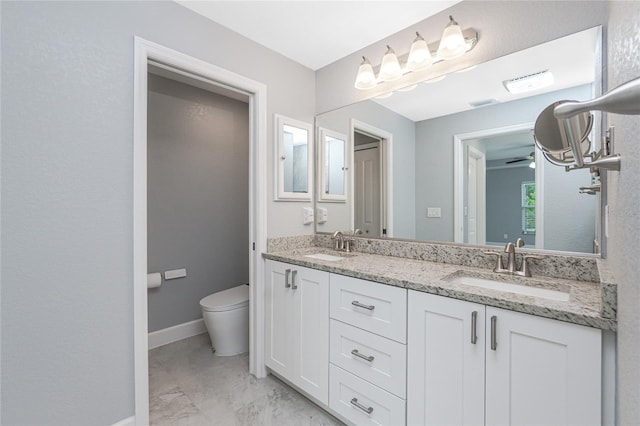 6 Medalist Ct, Rotonda West, FL 33947 - full bath with double vanity and marble look tile flooring