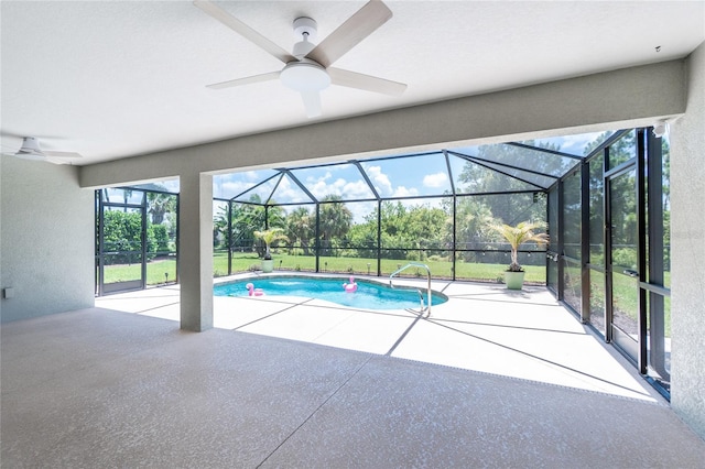 6 Medalist Ct, Rotonda West, FL 33947 - swimming pool with ceiling fan, a patio, and glass enclosure