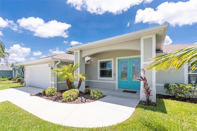 6 Medalist Ct, Rotonda West, FL 33947 - view of front facade featuring stucco siding, french doors, a garage, and a front lawn