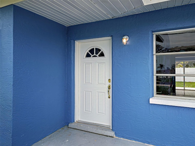 1295 S Maryknoll Rd, Englewood, FL 34223 - entrance to property featuring stucco siding