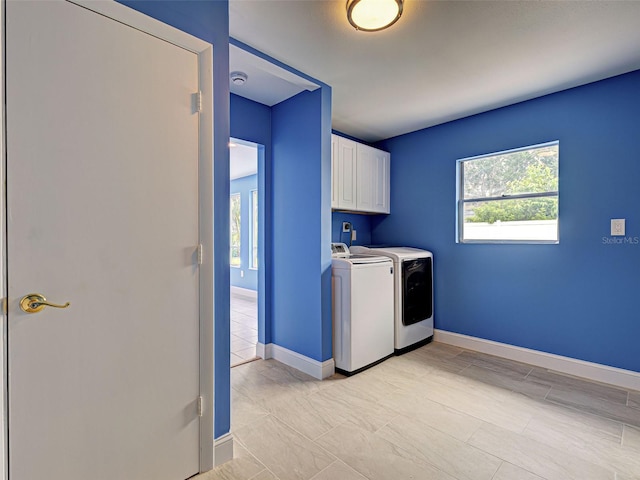 1295 S Maryknoll Rd, Englewood, FL 34223 - laundry area with washing machine and dryer and cabinet space
