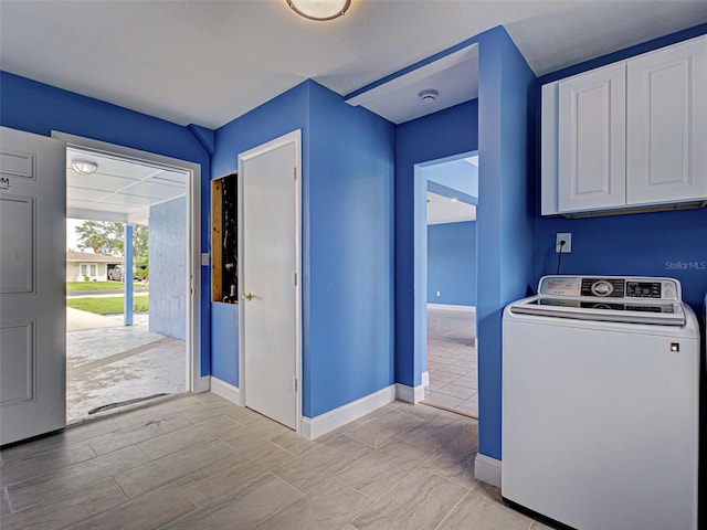 1295 S Maryknoll Rd, Englewood, FL 34223 - washroom featuring washer / dryer and cabinet space