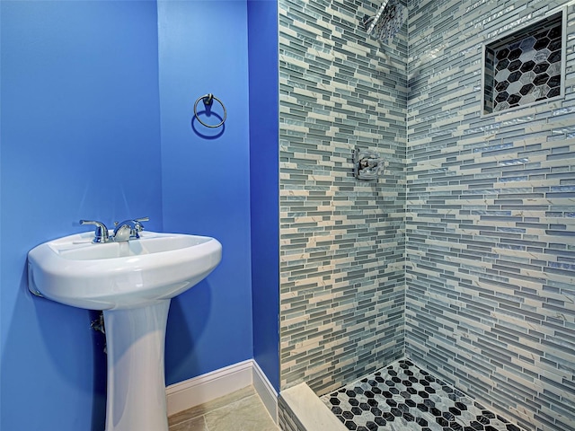 1295 S Maryknoll Rd, Englewood, FL 34223 - full bath featuring a tile shower and baseboards