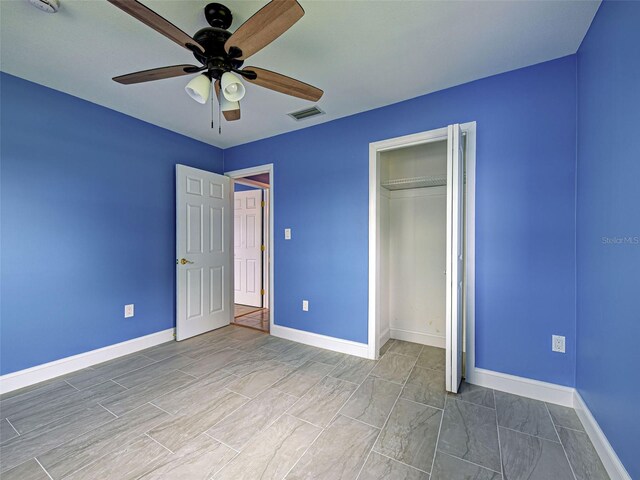 1295 S Maryknoll Rd, Englewood, FL 34223 - unfurnished bedroom with a closet and ceiling fan