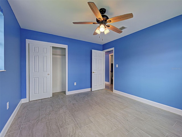 1295 S Maryknoll Rd, Englewood, FL 34223 - unfurnished bedroom featuring a closet and a ceiling fan