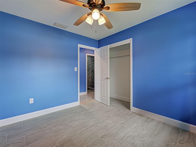 1295 S Maryknoll Rd, Englewood, FL 34223 - unfurnished bedroom with a closet and ceiling fan