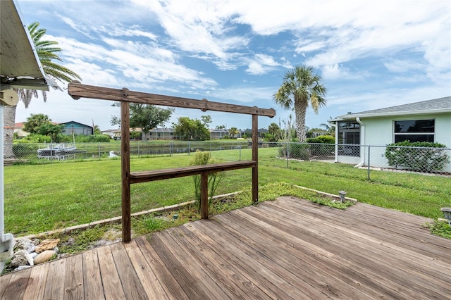 39 Caddy Rd, Rotonda West, FL 33947 - wooden deck with a fenced backyard