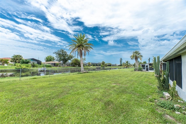 39 Caddy Rd, Rotonda West, FL 33947 - view of yard with a water view