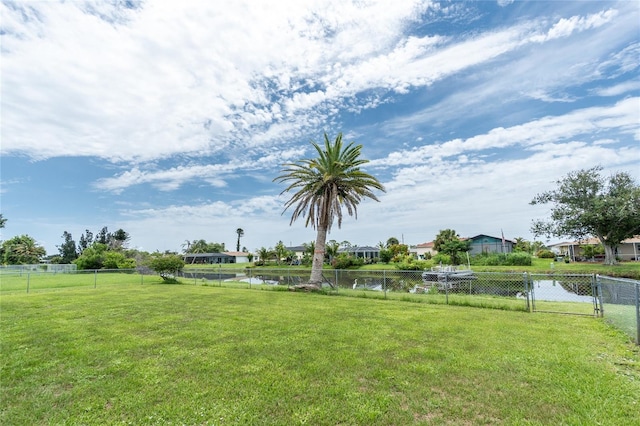 39 Caddy Rd, Rotonda West, FL 33947 - view of yard featuring a residential view and a water view