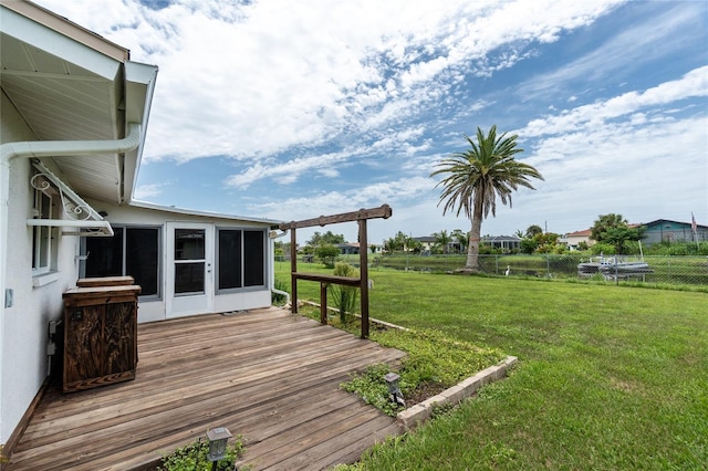 39 Caddy Rd, Rotonda West, FL 33947 - wooden deck with a sunroom