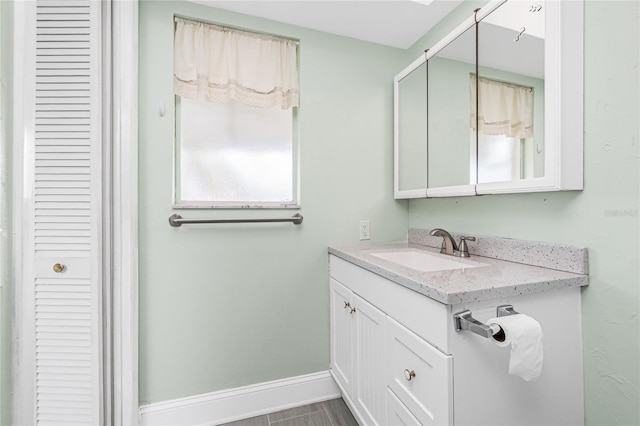 39 Caddy Rd, Rotonda West, FL 33947 - bathroom featuring a closet and vanity