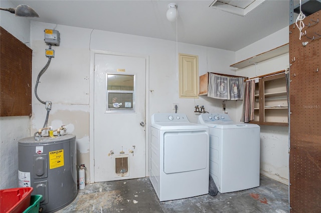 39 Caddy Rd, Rotonda West, FL 33947 - laundry area with water heater, washing machine and clothes dryer, and cabinet space