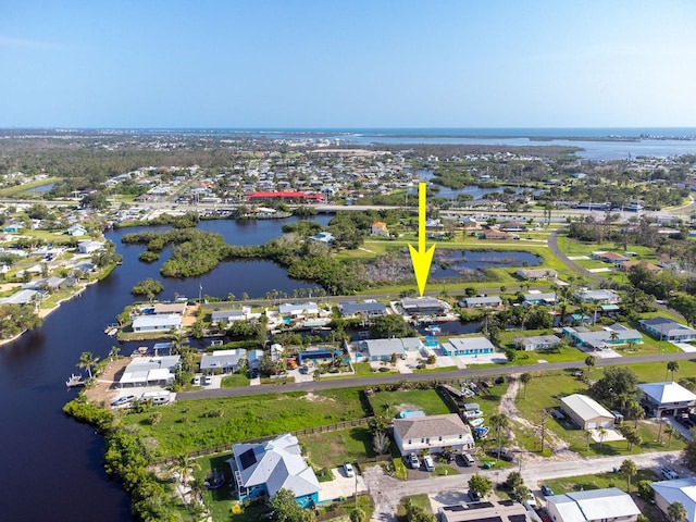 1030 Haste Ln, Englewood, FL 34223 - aerial view of property and surrounding area with a nearby body of water and nearby suburban area