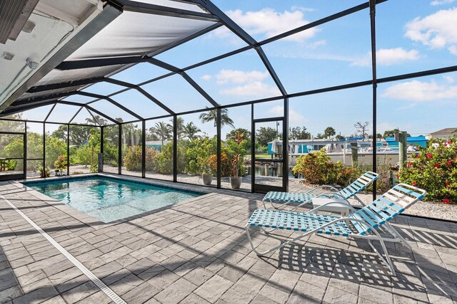 1030 Haste Ln, Englewood, FL 34223 - outdoor pool with a patio area and a lanai