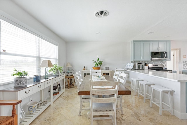 1030 Haste Ln, Englewood, FL 34223 - dining room featuring baseboards