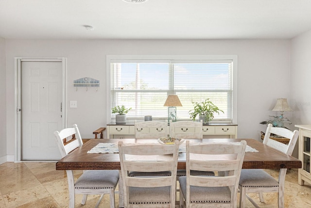 1030 Haste Ln, Englewood, FL 34223 - dining room featuring plenty of natural light