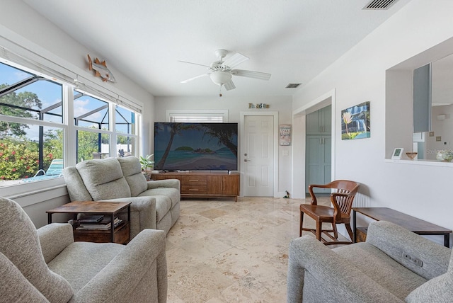 1030 Haste Ln, Englewood, FL 34223 - living room with ceiling fan