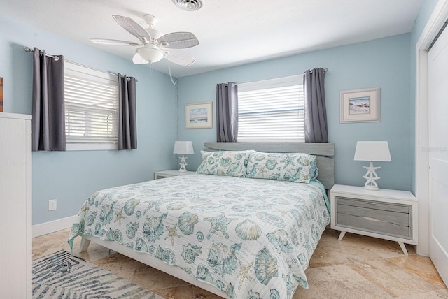1030 Haste Ln, Englewood, FL 34223 - bedroom featuring ceiling fan and baseboards