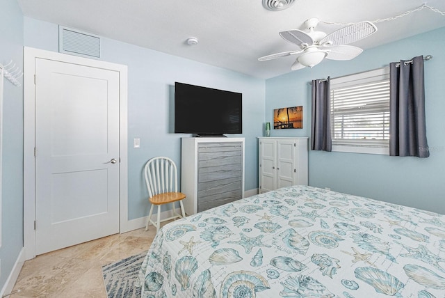 1030 Haste Ln, Englewood, FL 34223 - bedroom with baseboards and ceiling fan