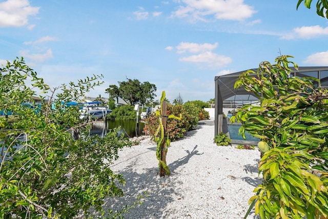1030 Haste Ln, Englewood, FL 34223 - view of yard with a lanai
