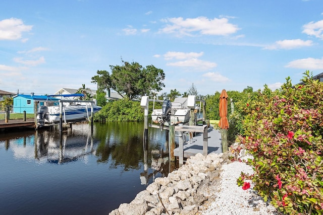 1030 Haste Ln, Englewood, FL 34223 - dock with boat lift and a water view