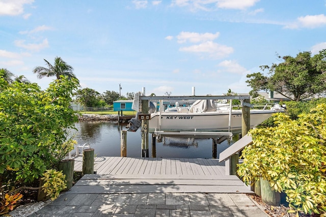 1030 Haste Ln, Englewood, FL 34223 - dock featuring boat lift and a water view