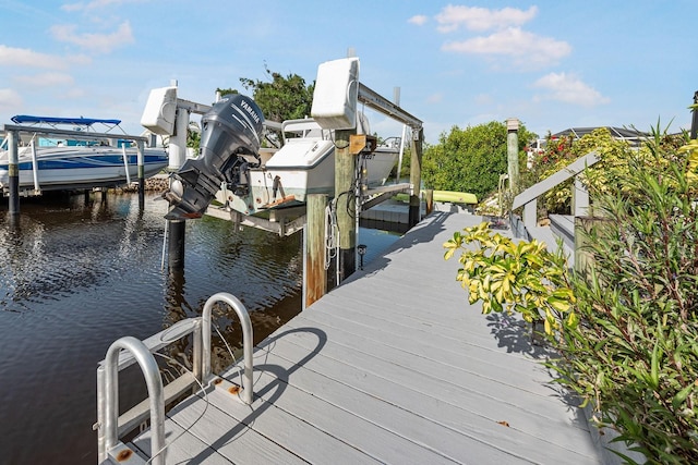1030 Haste Ln, Englewood, FL 34223 - dock with boat lift and a water view