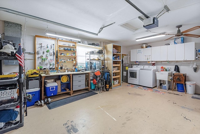 1030 Haste Ln, Englewood, FL 34223 - garage with independent washer and dryer, a garage door opener, a workshop area, and ceiling fan