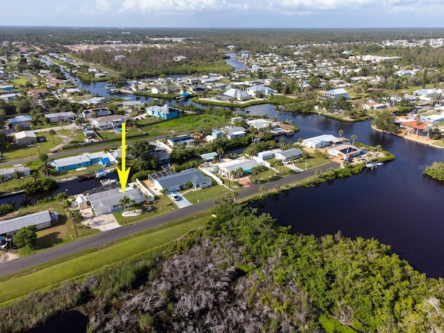 1030 Haste Ln, Englewood, FL 34223 - aerial view of property and surrounding area featuring a large body of water and nearby suburban area