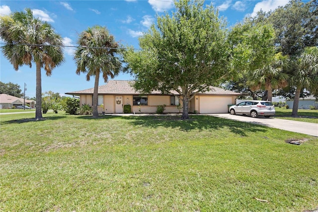 27581 Tierra Del Fuego Cir, Punta Gorda, FL 33983 - view of front of home featuring driveway, a garage, and a front yard