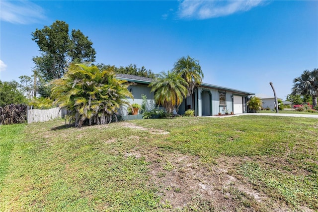 7104 Castilla St, Port Charlotte, FL 33981 - view of front of property featuring a garage and driveway