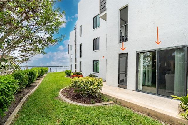2955 N Beach Rd Unit A411, Englewood, FL 34223 - view of yard featuring a water view