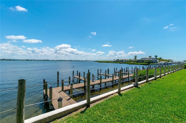 2955 N Beach Rd Unit A411, Englewood, FL 34223 - dock with a water view and a yard