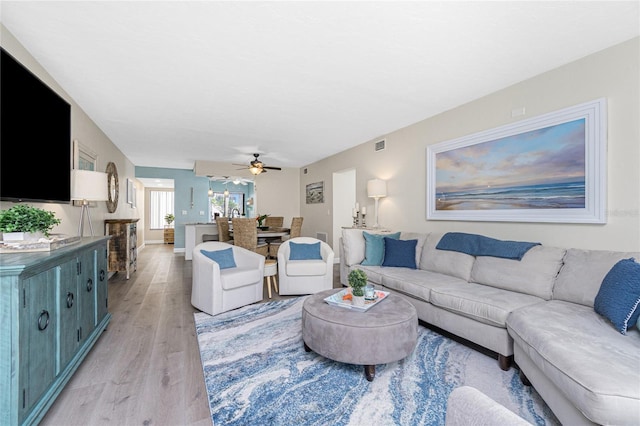 2955 N Beach Rd Unit A411, Englewood, FL 34223 - living area featuring light wood-style floors and ceiling fan