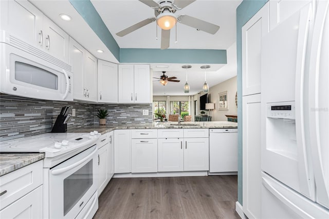 2955 N Beach Rd Unit A411, Englewood, FL 34223 - kitchen featuring white appliances, a ceiling fan, dark wood finished floors, decorative backsplash, and recessed lighting