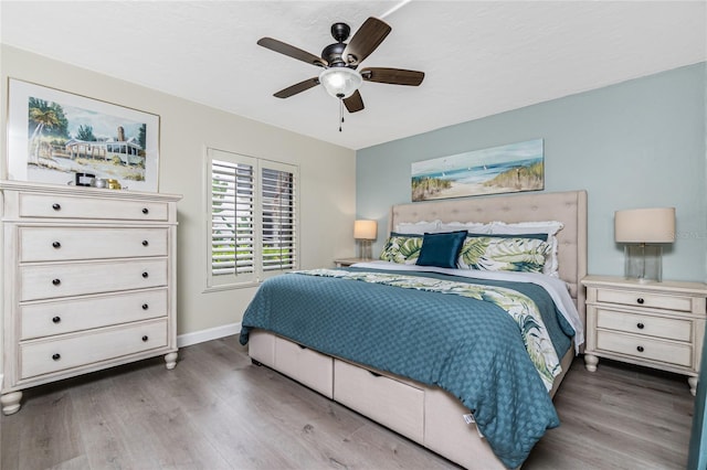 2955 N Beach Rd Unit A411, Englewood, FL 34223 - bedroom featuring wood finished floors and a ceiling fan
