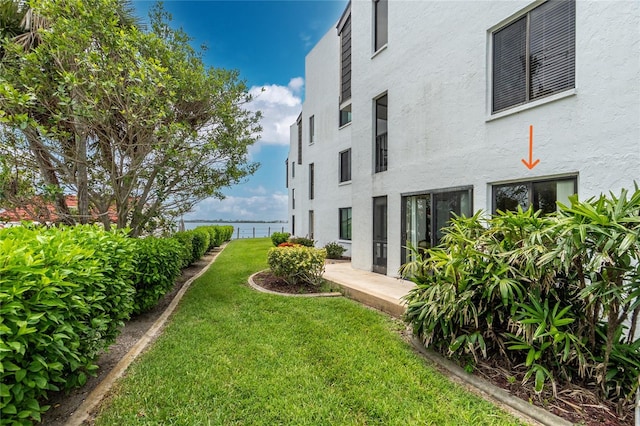 2955 N Beach Rd Unit A411, Englewood, FL 34223 - view of yard featuring a water view