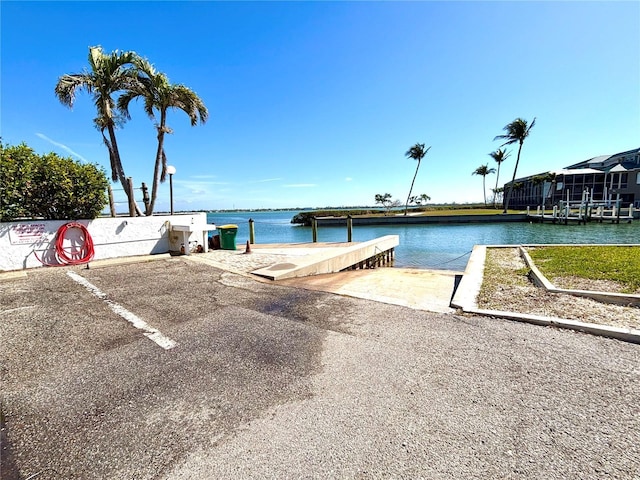2955 N Beach Rd Unit A411, Englewood, FL 34223 - exterior space featuring a boat ramp and a water view