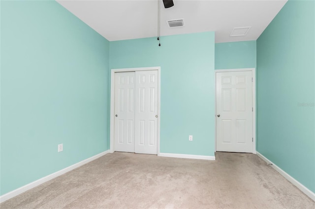 1530 Hyssop Loop, North Port, FL 34289 - unfurnished bedroom featuring carpet floors, a closet, and a ceiling fan
