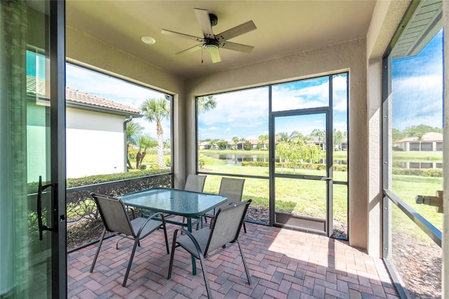 1530 Hyssop Loop, North Port, FL 34289 - sunroom featuring a water view, a ceiling fan, and outdoor dining space