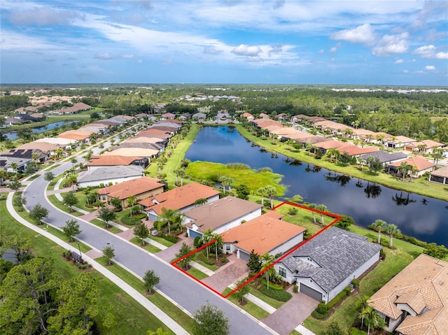 1530 Hyssop Loop, North Port, FL 34289 - aerial view of residential area with property parcel outlined and a large body of water