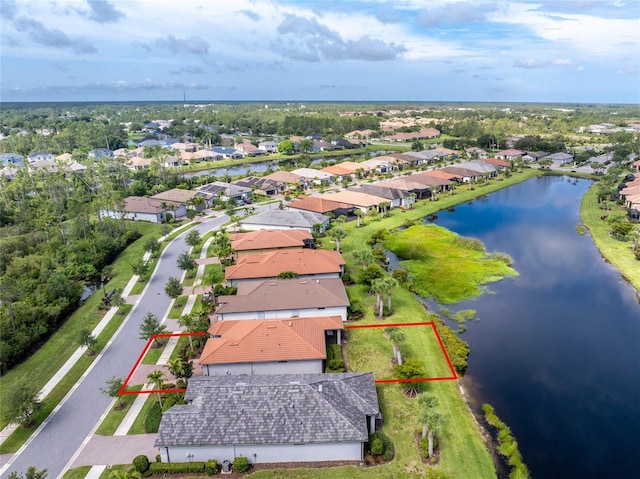 1530 Hyssop Loop, North Port, FL 34289 - aerial view of residential area with a nearby body of water and property parcel outlined