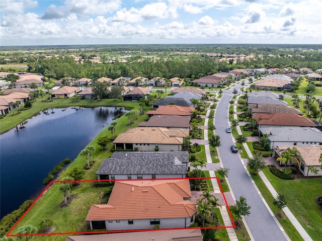 1530 Hyssop Loop, North Port, FL 34289 - aerial perspective of suburban area with a large body of water and property parcel outlined