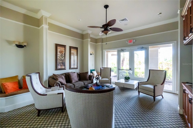 1530 Hyssop Loop, North Port, FL 34289 - living room with dark carpet, a ceiling fan, and ornamental molding