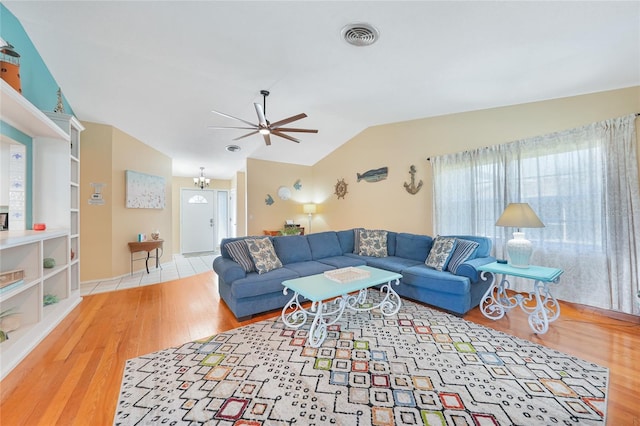 7453 Spinnaker Blvd, Englewood, FL 34224 - living area featuring ceiling fan, lofted ceiling, and wood finished floors