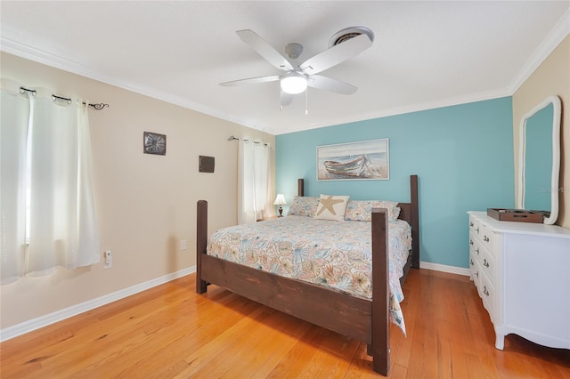 7453 Spinnaker Blvd, Englewood, FL 34224 - bedroom featuring light wood-type flooring, ornamental molding, and a ceiling fan
