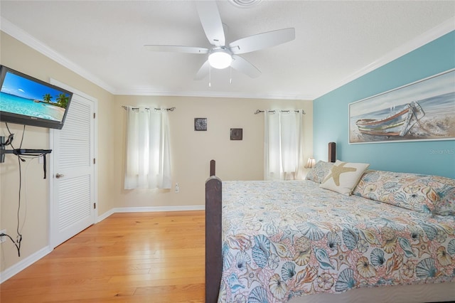 7453 Spinnaker Blvd, Englewood, FL 34224 - bedroom featuring wood finished floors, crown molding, and ceiling fan